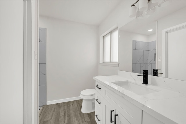 11807 Oceanview St, Missouri City, TX 77071 - bathroom with vanity, wood finished floors, and a shower