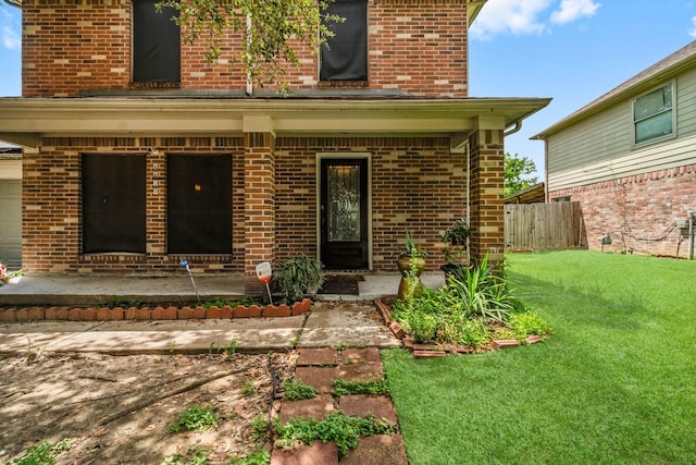 6619 Amberfield Ln, Katy, TX 77449 - doorway to property featuring brick siding