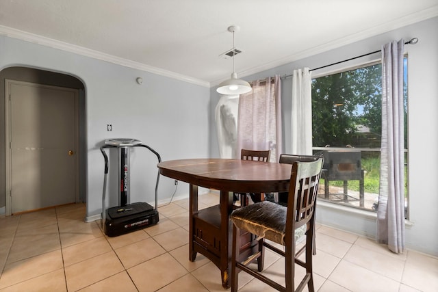 6619 Amberfield Ln, Katy, TX 77449 - dining area with crown molding and light tile patterned floors