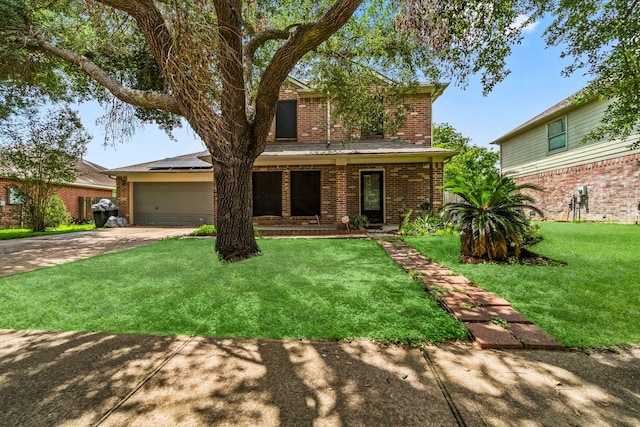 6619 Amberfield Ln, Katy, TX 77449 - traditional-style house with brick siding, concrete driveway, solar panels, an attached garage, and a front lawn