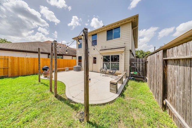 9415 Cholla Hill Ct, Houston, TX 77064 - back of house with a patio area and a fenced backyard