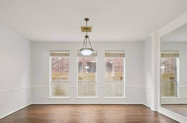 21331 Willow Glade Dr, Katy, TX 77450 - unfurnished dining area with wood finished floors and plenty of natural light