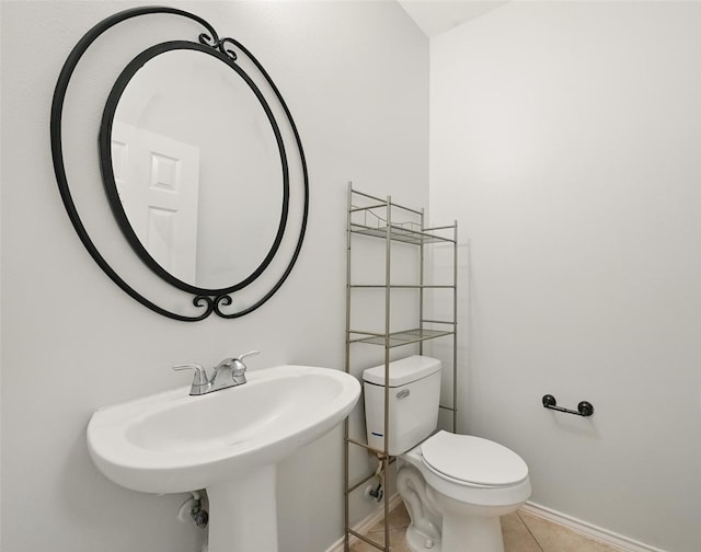 21331 Willow Glade Dr, Katy, TX 77450 - bathroom with baseboards and tile patterned flooring