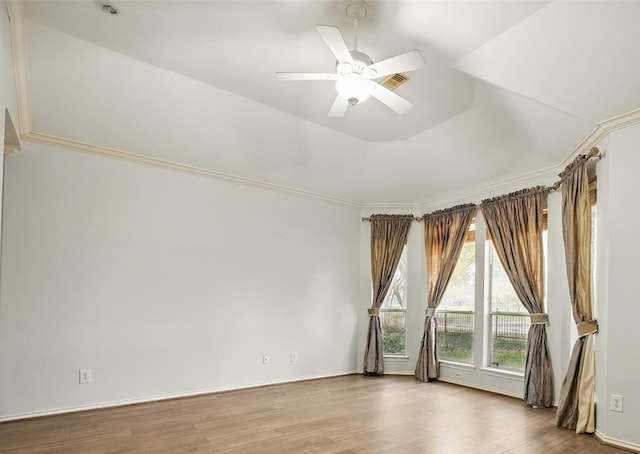21331 Willow Glade Dr, Katy, TX 77450 - unfurnished room featuring wood finished floors, a ceiling fan, a raised ceiling, and crown molding