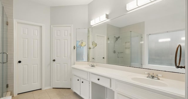 21331 Willow Glade Dr, Katy, TX 77450 - full bathroom with tile patterned floors, a shower stall, and double vanity