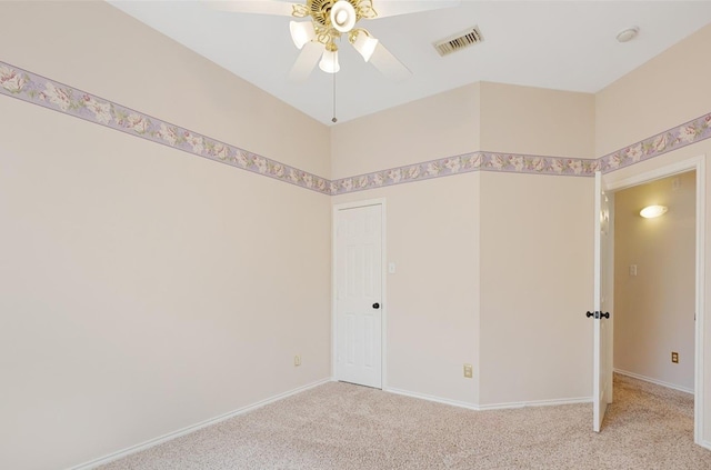 21331 Willow Glade Dr, Katy, TX 77450 - empty room featuring a ceiling fan, light colored carpet, and a smoke detector