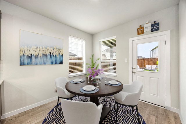 308 Spruce Oak Ln, Waller, TX 77484 - dining room featuring light wood finished floors