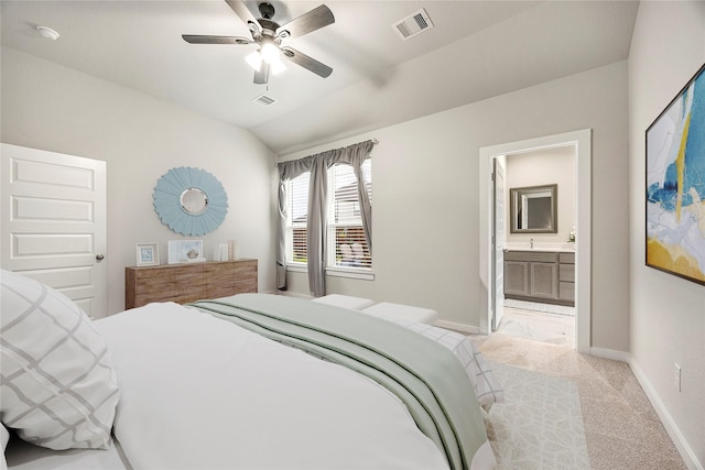 308 Spruce Oak Ln, Waller, TX 77484 - bedroom with lofted ceiling, light carpet, ensuite bathroom, and a ceiling fan