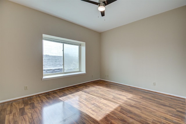 2213 S Braeswood Blvd Unit 13C, Houston, TX 77030 - spare room with a ceiling fan and wood finished floors