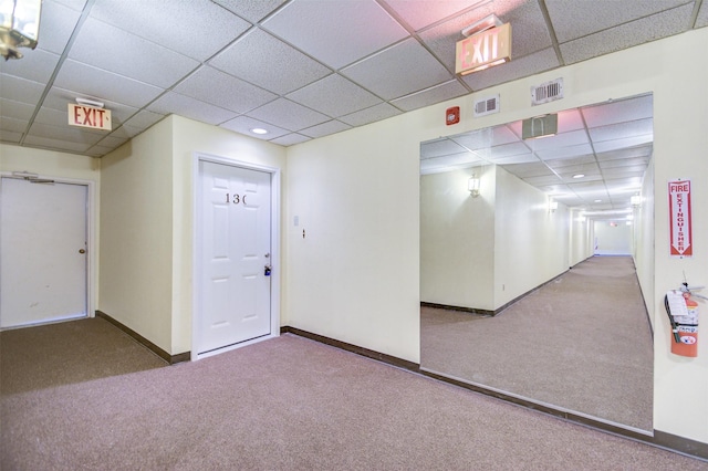 2213 S Braeswood Blvd Unit 13C, Houston, TX 77030 - corridor featuring a paneled ceiling, carpet flooring, and recessed lighting