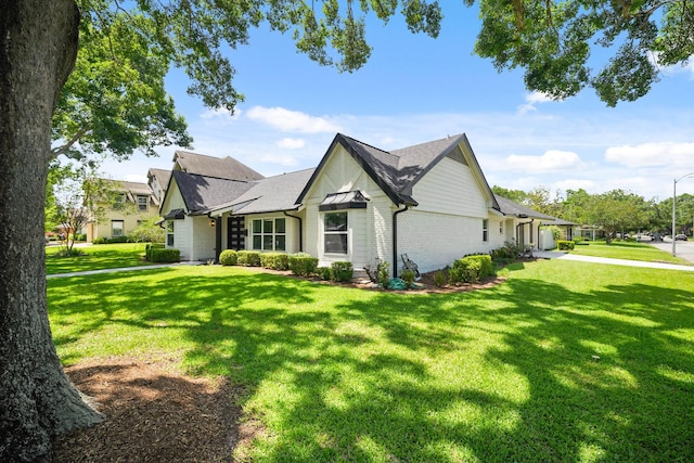 4302 Wigton Dr, Houston, TX 77096 - view of home's exterior with a yard and driveway