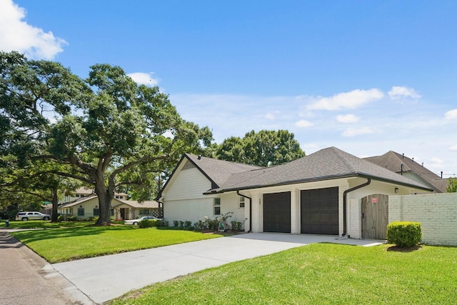 4302 Wigton Dr, Houston, TX 77096 - view of front facade featuring an attached garage, concrete driveway, a shingled roof, and brick siding