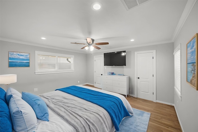 4302 Wigton Dr, Houston, TX 77096 - bedroom with ornamental molding, light wood finished floors, recessed lighting, and ceiling fan