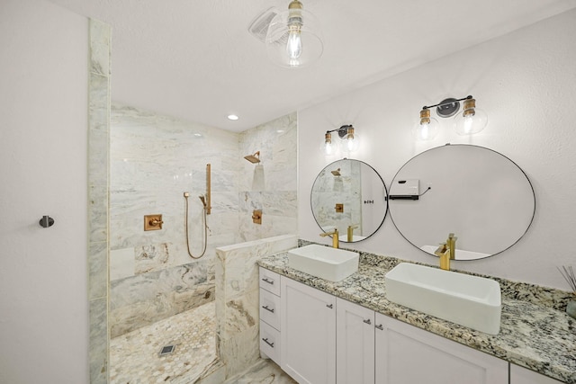 4302 Wigton Dr, Houston, TX 77096 - full bath with double vanity, a walk in shower, marble finish floors, and a ceiling fan