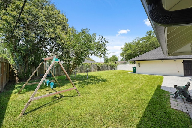 4302 Wigton Dr, Houston, TX 77096 - fenced backyard with a playground and a patio