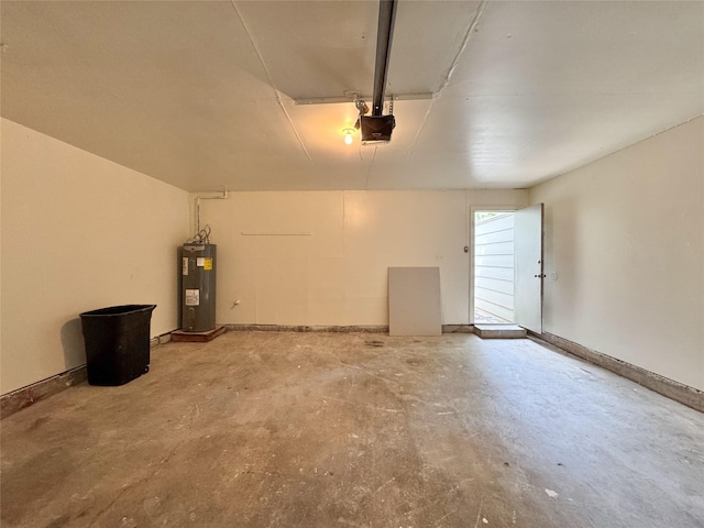 12991 Wirevine Ln, Houston, TX 77072 - garage featuring water heater and a garage door opener