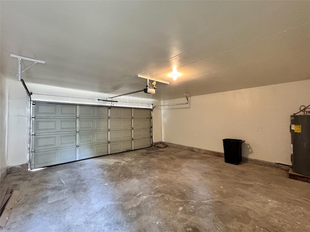 12991 Wirevine Ln, Houston, TX 77072 - garage featuring a garage door opener and water heater