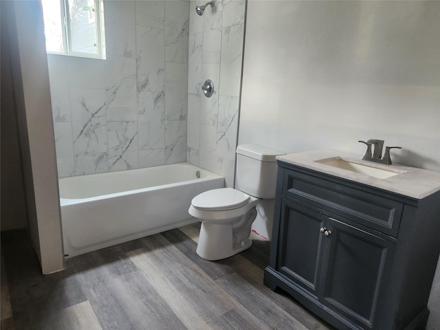 2926 Wimberly St, Houston, TX 77093 - full bathroom featuring vanity, wood finished floors, and tub / shower combination