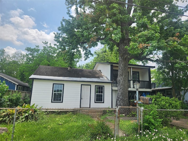 2926 Wimberly St, Houston, TX 77093 - view of front of property featuring a fenced front yard, a balcony, and a gate