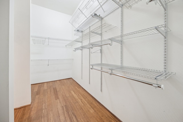705 Main St Unit 302, Houston, TX 77002 - spacious closet featuring light wood-style floors