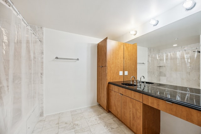 705 Main St Unit 302, Houston, TX 77002 - bathroom featuring vanity and a shower with curtain