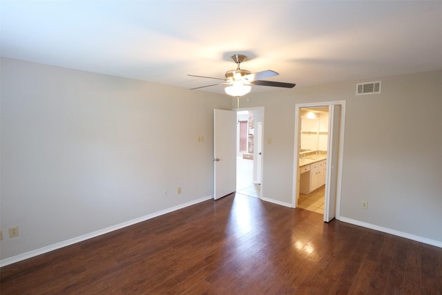 20246 Pittsford Dr, Katy, TX 77450 - unfurnished bedroom with wood finished floors, ensuite bathroom, and a ceiling fan