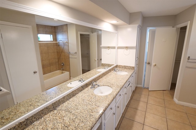 20246 Pittsford Dr, Katy, TX 77450 - bathroom with double vanity, tile patterned floors, and bathing tub / shower combination