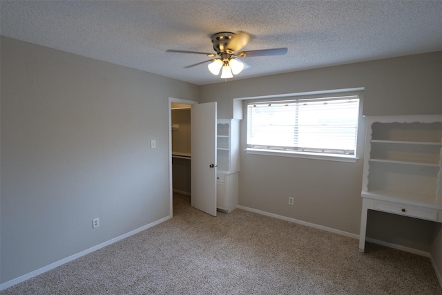 20246 Pittsford Dr, Katy, TX 77450 - unfurnished bedroom with carpet, a textured ceiling, and ceiling fan