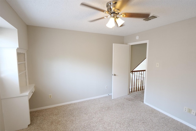 20246 Pittsford Dr, Katy, TX 77450 - carpeted spare room featuring ceiling fan and a textured ceiling