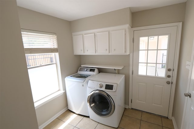 20246 Pittsford Dr, Katy, TX 77450 - laundry area featuring independent washer and dryer, plenty of natural light, and light tile patterned floors
