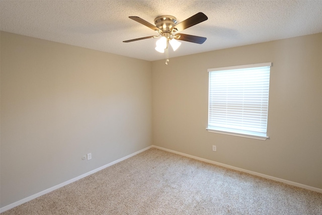 20246 Pittsford Dr, Katy, TX 77450 - carpeted spare room with a ceiling fan and a textured ceiling