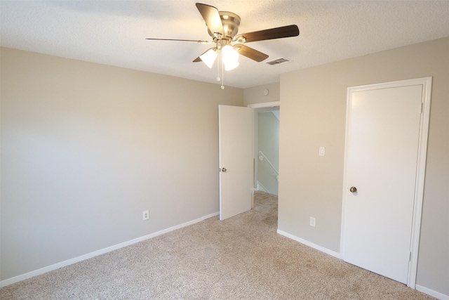 20246 Pittsford Dr, Katy, TX 77450 - unfurnished bedroom with light colored carpet and ceiling fan