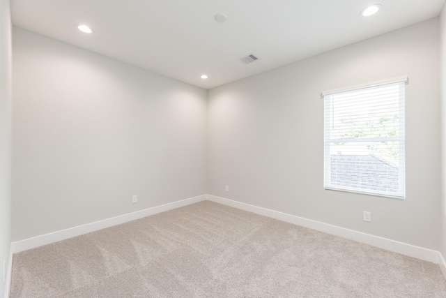 3310 Bremond St, Houston, TX 77004 - empty room featuring light colored carpet and recessed lighting