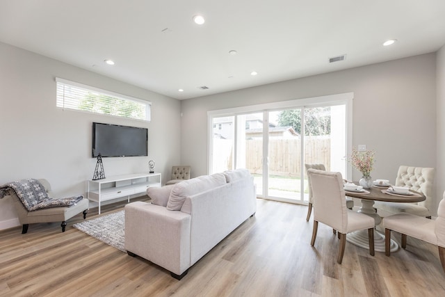 3310 Bremond St, Houston, TX 77004 - living area featuring light wood-style flooring and recessed lighting