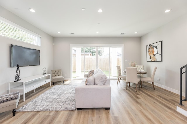 3310 Bremond St, Houston, TX 77004 - living area featuring healthy amount of natural light, light wood finished floors, and recessed lighting
