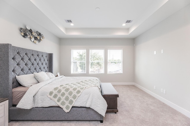 3310 Bremond St, Houston, TX 77004 - bedroom featuring a raised ceiling, light carpet, and recessed lighting