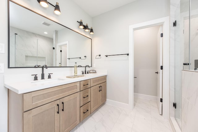 3310 Bremond St, Houston, TX 77004 - full bath with double vanity, a marble finish shower, and marble finish floors