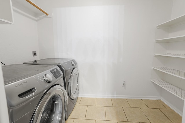 17919 Eagle Pass Falls Ct, Humble, TX 77346 - laundry room featuring independent washer and dryer and light tile patterned floors