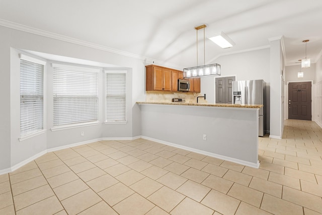 17919 Eagle Pass Falls Ct, Humble, TX 77346 - kitchen with appliances with stainless steel finishes, brown cabinets, ornamental molding, light tile patterned floors, and a peninsula