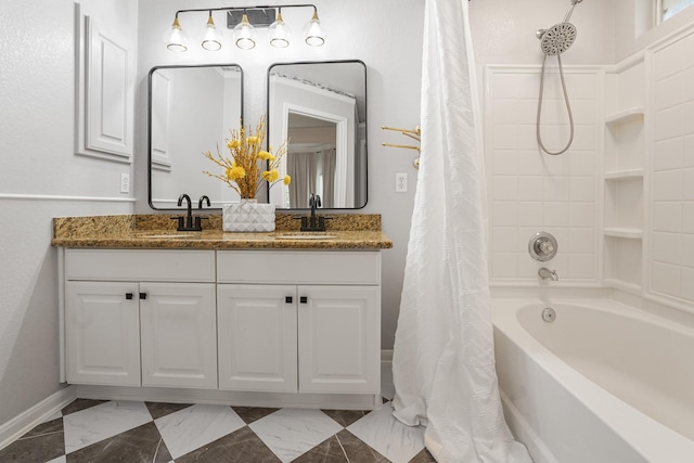 17919 Eagle Pass Falls Ct, Humble, TX 77346 - full bathroom with marble look tile flooring, double vanity, and shower / bathtub combination with curtain