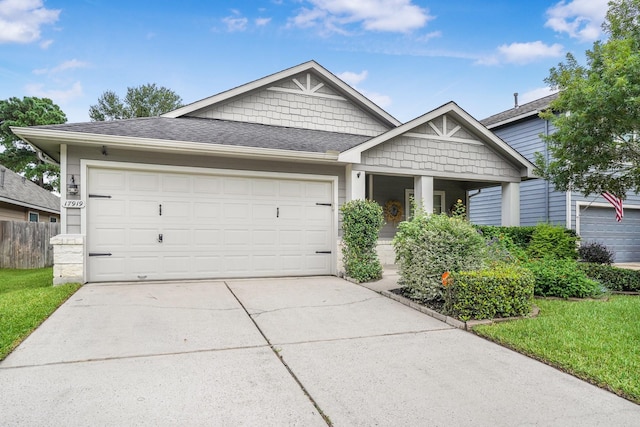 17919 Eagle Pass Falls Ct, Humble, TX 77346 - craftsman inspired home featuring concrete driveway, a garage, and a shingled roof