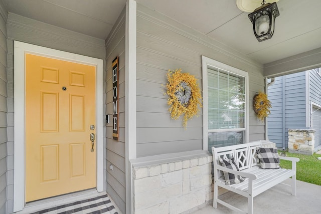 17919 Eagle Pass Falls Ct, Humble, TX 77346 - view of exterior entry featuring a porch