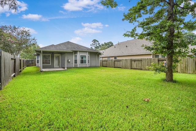17919 Eagle Pass Falls Ct, Humble, TX 77346 - rear view of property featuring a patio and a fenced backyard