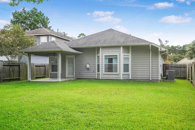 17919 Eagle Pass Falls Ct, Humble, TX 77346 - back of house with a patio area, a fenced backyard, and roof with shingles