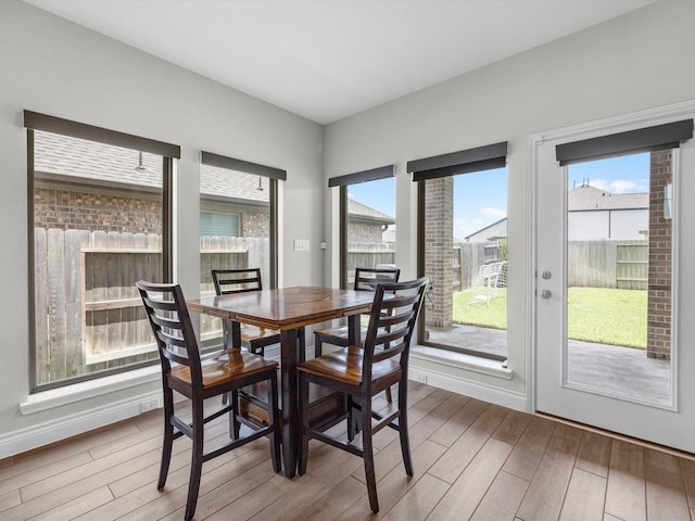 23027 Needlegrass Rd, Katy, TX 77493 - dining area featuring wood finished floors and baseboards