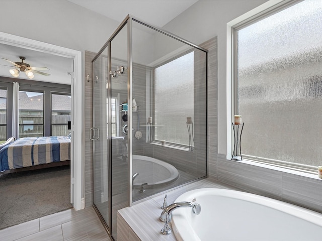 23027 Needlegrass Rd, Katy, TX 77493 - full bath with connected bathroom, a garden tub, a shower stall, and ceiling fan