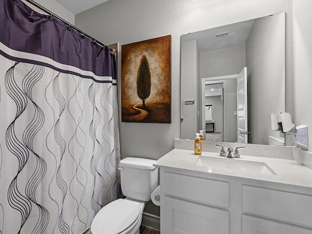 23027 Needlegrass Rd, Katy, TX 77493 - full bath with vanity, a textured wall, and a shower with curtain