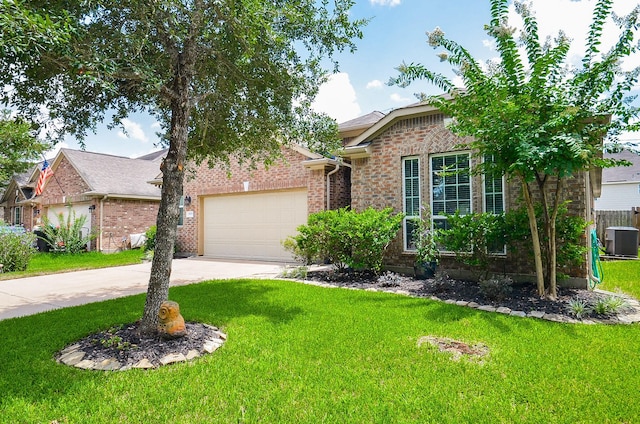 6215 Carnaby Ln, Rosenberg, TX 77471 - ranch-style home with brick siding, a garage, driveway, and a front lawn