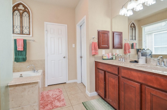 6215 Carnaby Ln, Rosenberg, TX 77471 - bathroom featuring tile patterned floors, a bath, and double vanity