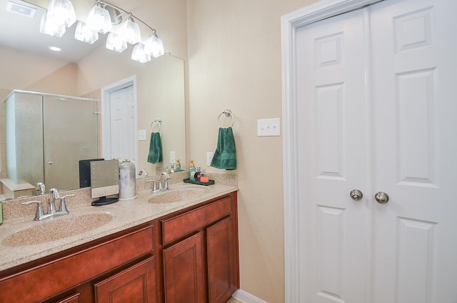6215 Carnaby Ln, Rosenberg, TX 77471 - bathroom with a shower stall and double vanity